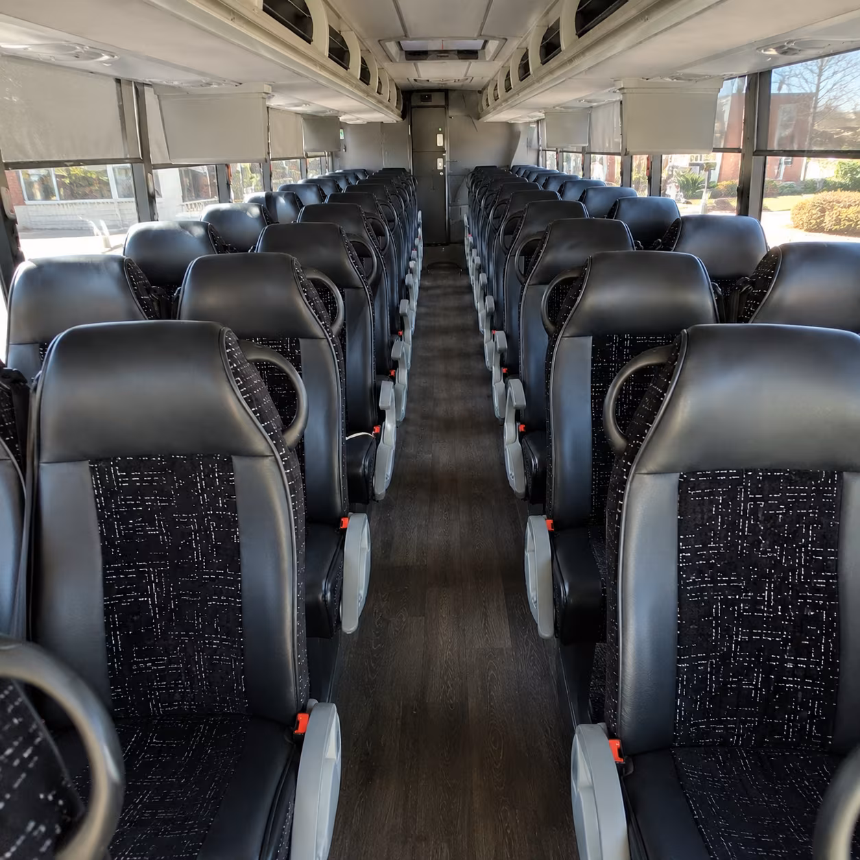 aurora 54 passenger charter bus inside